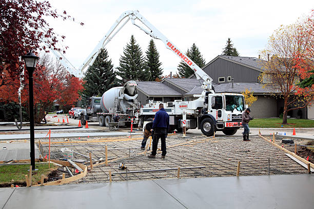 concrete contractor working on a driveway