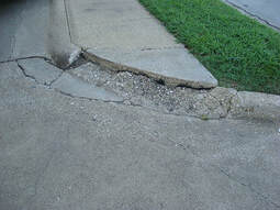 damaged concrete drive way
